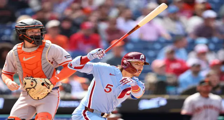 Philadelphia Phillies batter number 5 swinging at Citizens Bank Park with San Francisco Giants catcher in background during May 1 2026 MLB game