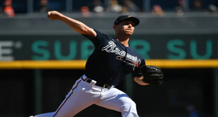 Atlanta Braves pitcher in mid-throw during game against New York Yankees on March 13, 2026