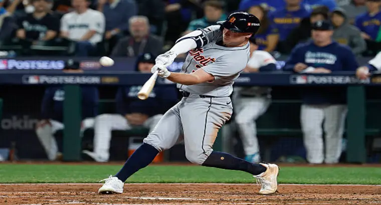 Detroit Tigers batter in gray away uniform swings during the 2025 MLB postseason game against the Seattle Mariners at T-Mobile Park